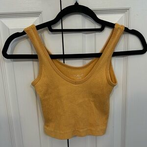 😀😀😀Out From Under. Golden yellow ribbed cropped tank. Size small.
